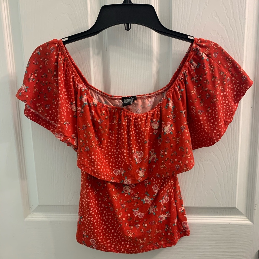 Red off shoulder top.